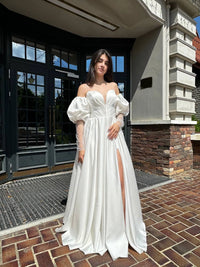 Elegant Silhouette Wedding Dress with Open Shoulders | Deep V-Neckline & Button Detail | Romantic Bridal Gown