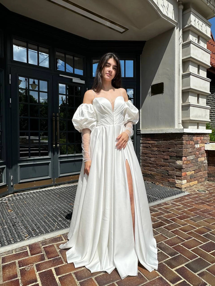 Elegant Silhouette Wedding Dress with Open Shoulders | Deep V-Neckline & Button Detail | Romantic Bridal Gown