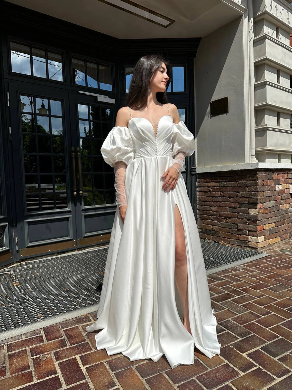 Elegant Silhouette Wedding Dress with Open Shoulders | Deep V-Neckline & Button Detail | Romantic Bridal Gown
