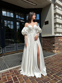 Elegant Silhouette Wedding Dress with Open Shoulders | Deep V-Neckline & Button Detail | Romantic Bridal Gown