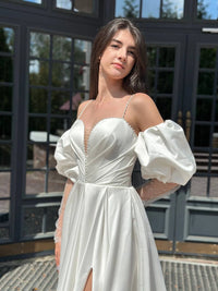 Elegant Silhouette Wedding Dress with Open Shoulders | Deep V-Neckline & Button Detail | Romantic Bridal Gown