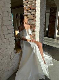 Architectural Wedding Dress with Draped Collar | Voluminous Skirt | Deep Neckline Bodice
