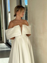 Architectural Wedding Dress with Draped Collar | Voluminous Skirt | Deep Neckline Bodice