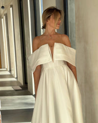 Architectural Wedding Dress with Draped Collar | Voluminous Skirt | Deep Neckline Bodice