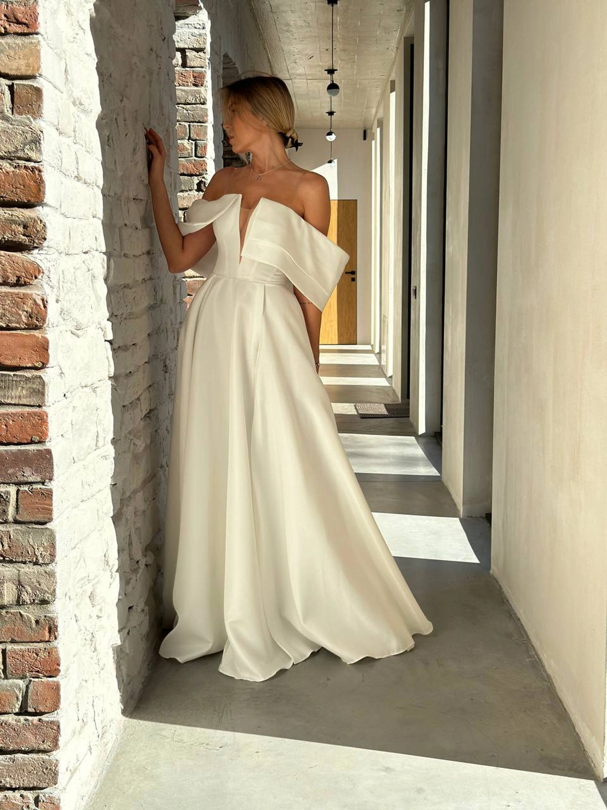 Architectural Wedding Dress with Draped Collar | Voluminous Skirt | Deep Neckline Bodice
